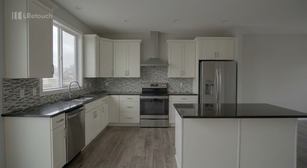 Raw and unedited straight-out-of-the-camera real estate kitchen photo looking flat and hazy.